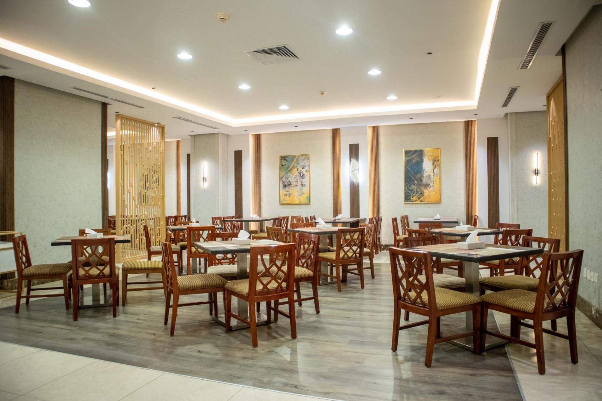 Emaar Royal Hotel Medina Ngoại thất bức ảnh The dining room at the hospital